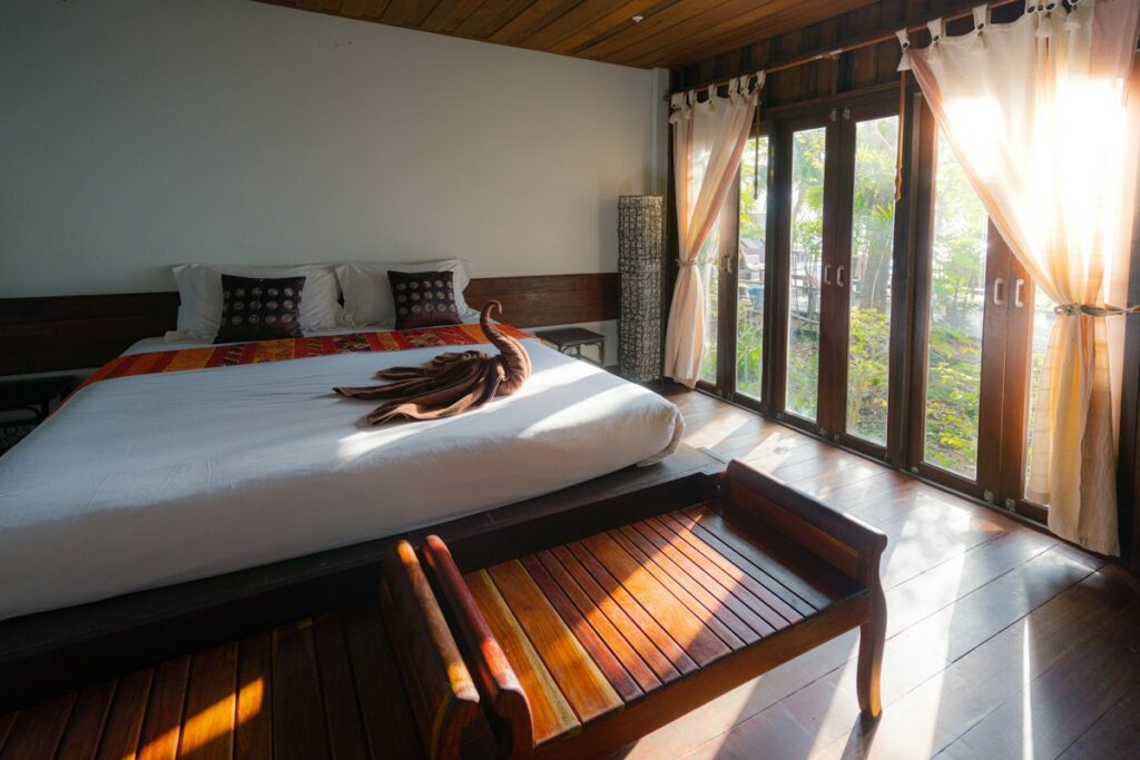 Historic boutique hotel sun-drenched stone terrace overlooking peaceful countryside