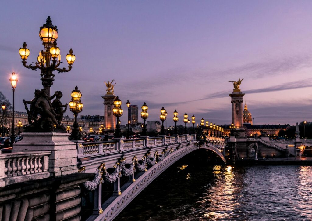 Historic European city boulevard with classical Parisian architecture in golden afternoon light