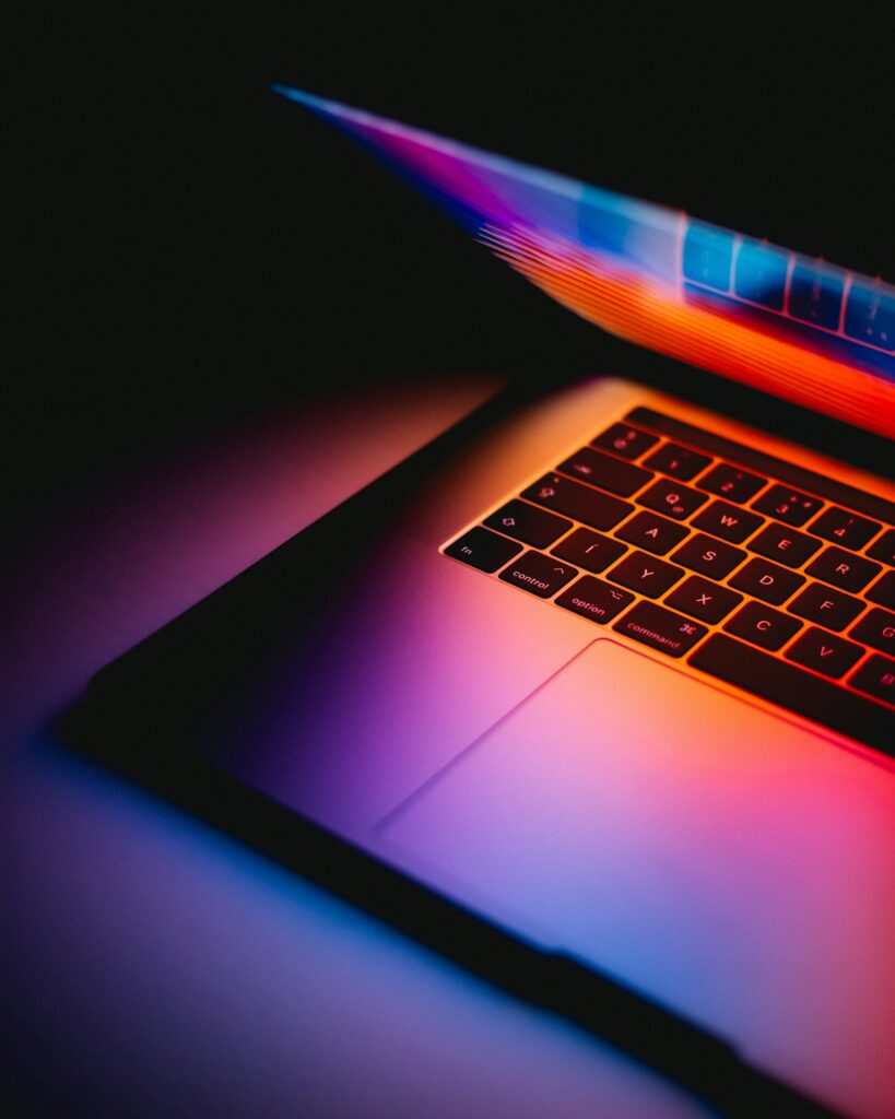 Sleek metallic laptop and minimalist wireless keyboard