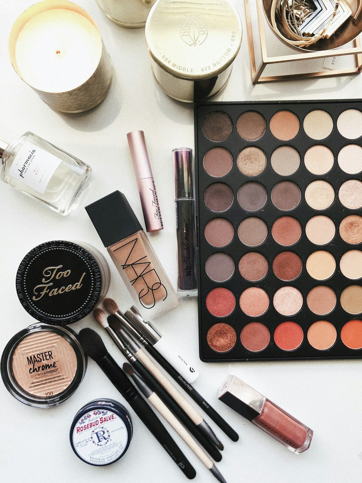 Luxury everyday cosmetic compacts, cream blush, and beauty makeup palette